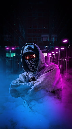 Mysterious Hooded Figure with Glowing Red Eyes in Neon-Lit Urban Fog HD phone wallpaper