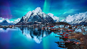 Norway Fjord Village Under Vibrant Green Aurora Borealis and Snowy Mountains HD wallpaper
