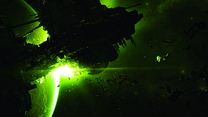 Massive Space Station Silhouette Against Glowing Green Planet in Deep Space HD wallpaper