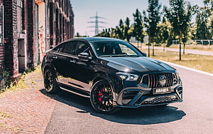 Black Brabus 800 Mercedes-AMG GLE 63 Coupe Parked on Urban Street HD wallpaper