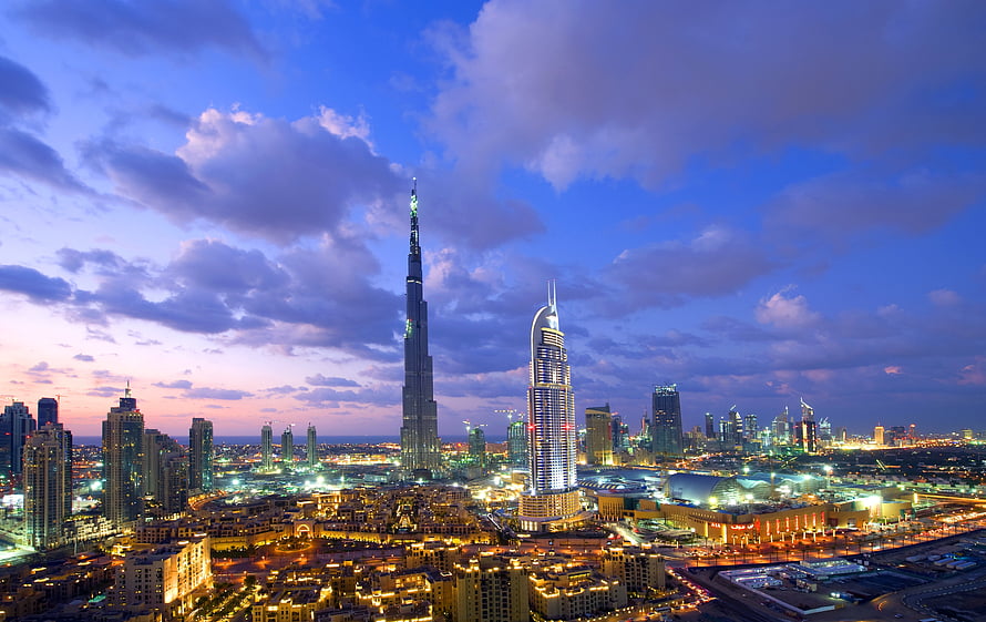 Dubai Skyline at Dusk Featuring Burj Khalifa and City Lights HD wallpaper
