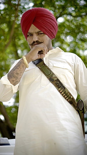 Sidhu Moose Wala in Red Turban and White Kurta with Camouflage Bandolier HD phone wallpaper