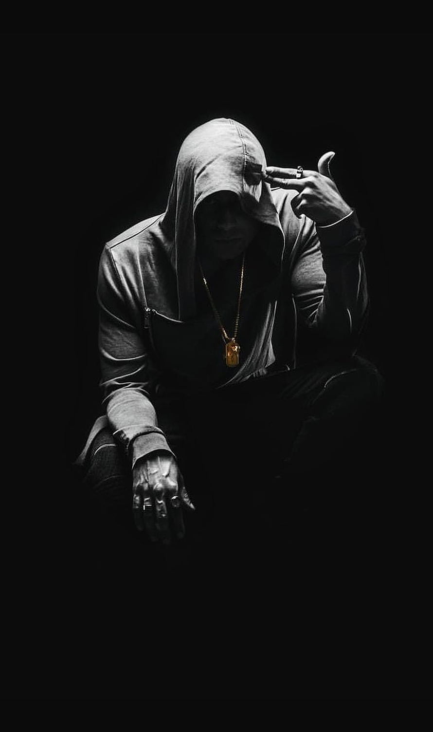 Moody Portrait of a Hooded Man Smoking a Cigarette in Dramatic Black and White Lighting HD phone wallpaper