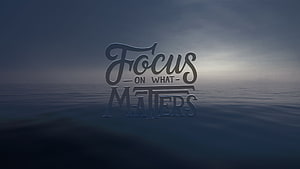 Focus On What Matters Inspirational Quote Over Calm Ocean Horizon at Dusk HD wallpaper