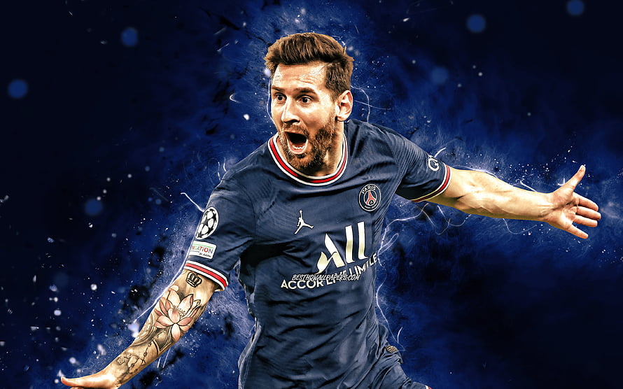 Lionel Messi in Paris Saint-Germain kit celebrating with dramatic blue background HD wallpaper
