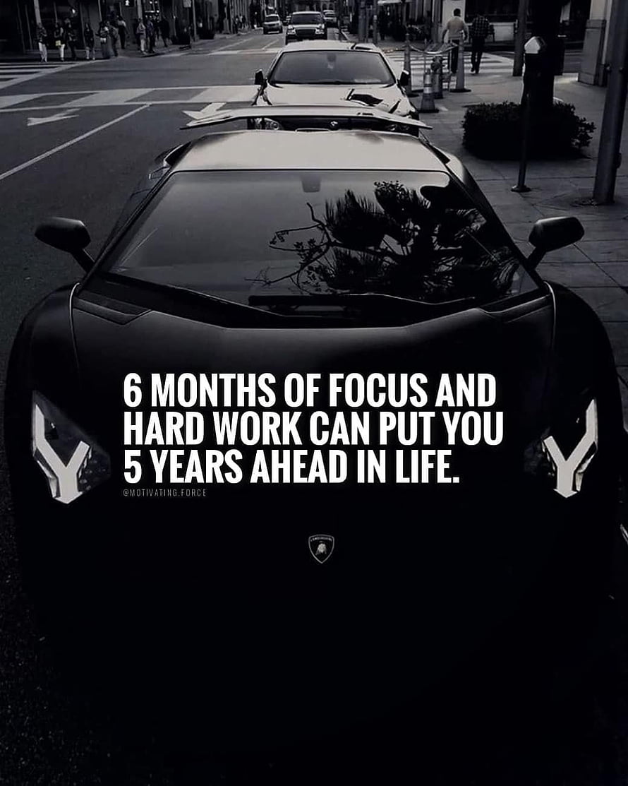 Black Lamborghini Huracan Front View with Motivational Quote on City Street HD phone wallpaper