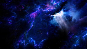 Vibrant Cosmic Nebula with Swirling Purple and Blue Gas Clouds in Deep Space HD wallpaper