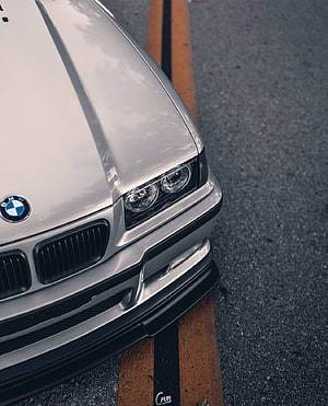 Silver BMW E36 M3 Front Bumper and Headlight Detail on Asphalt Road HD phone wallpaper
