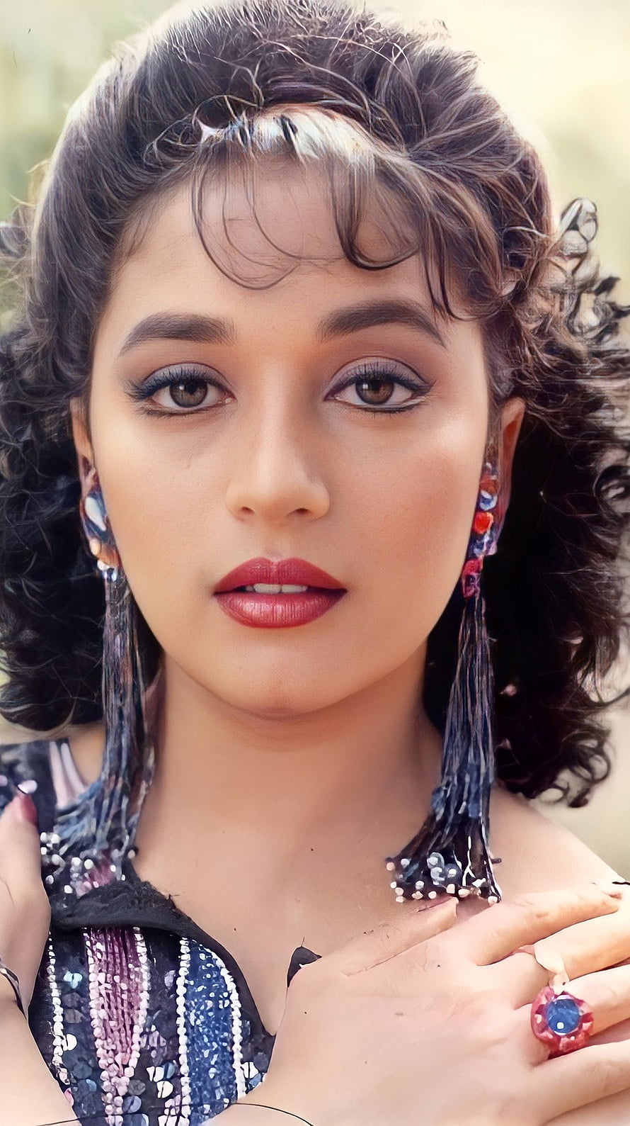 Madhuri Dixit Portrait with Curly Hair and Statement Jewelry HD phone wallpaper