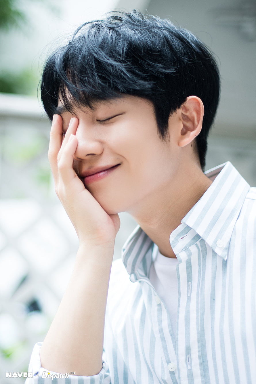 Jung Hae In smiling with eyes closed in a light striped shirt HD phone wallpaper