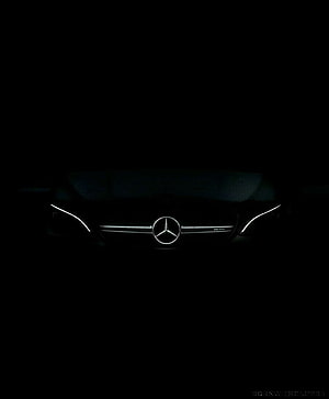 Mercedes-Benz Front Grille and Emblem Illuminated in Darkness HD phone wallpaper