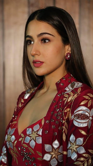 Sara Ali Khan in an embroidered red velvet outfit with floral detailing and statement earrings HD phone wallpaper