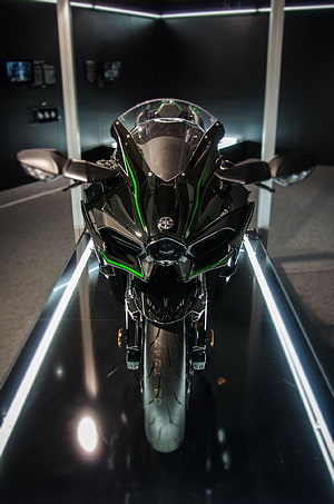 Kawasaki H2R Superbike Front View with Green Accents on Display Platform HD phone wallpaper