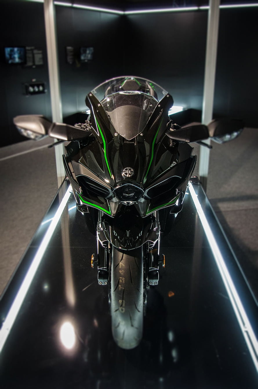 Kawasaki H2R Superbike Front View with Green Accents on Display Platform HD phone wallpaper