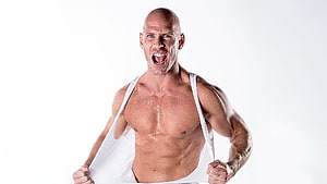 Johnny Sins Intense Fitness Portrait With Defined Muscles And White Tank Top HD wallpaper