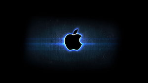 Glowing Apple Logo on Dark Brushed Metal Background with Blue Light Flare HD wallpaper
