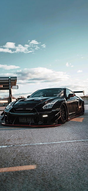 Black Nissan GT-R R35 Widebody Stance on Asphalt with Cloudy Sky HD phone wallpaper