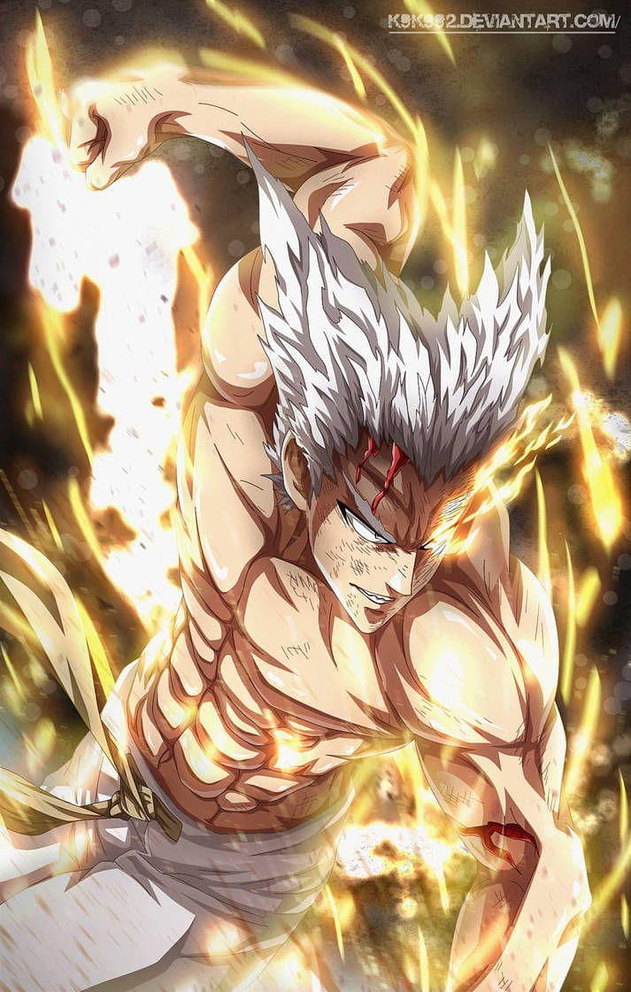 Garou from One Punch Man in a Fierce Battle Pose Surrounded by Golden Energy HD phone wallpaper
