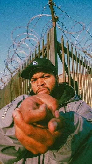 Ice Cube Rapper Portrait With Barbed Wire Fence And Intense Stare HD phone wallpaper
