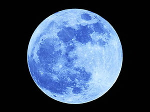 Full Moon in Deep Space with Blue Tint and Cratered Surface HD wallpaper