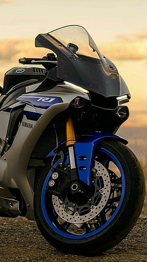 Yamaha R1 Superbike Front Profile with Blue Accents at Sunset HD phone wallpaper