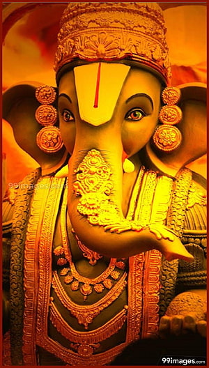 Ornate Ganesha Statue With Golden Jewelry And Intricate Crown Details HD phone wallpaper