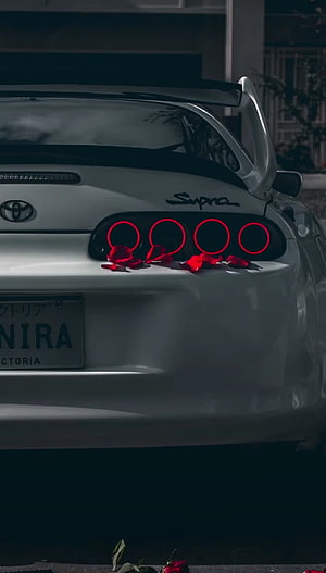 White Toyota Supra MK4 Rear View With Red Taillights and Rose Petals HD phone wallpaper