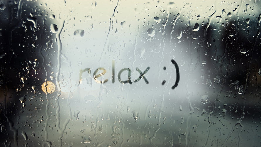 Rainy Day Window with Relax Message and Water Droplets on Glass HD wallpaper