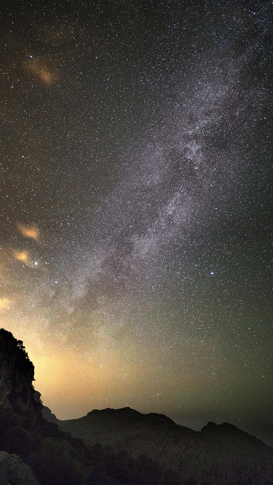 Milky Way Galaxy Arching Over Silhouetted Mountain Ridge in Mallorca, Spain HD phone wallpaper