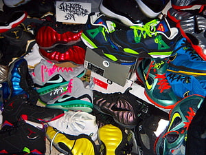 Colorful Collection of Nike and Jordan Sneakers Piled Together HD wallpaper