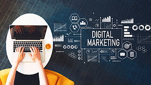 Overhead view of hands typing on a laptop with digital marketing infographic and data charts on a dark background HD wallpaper