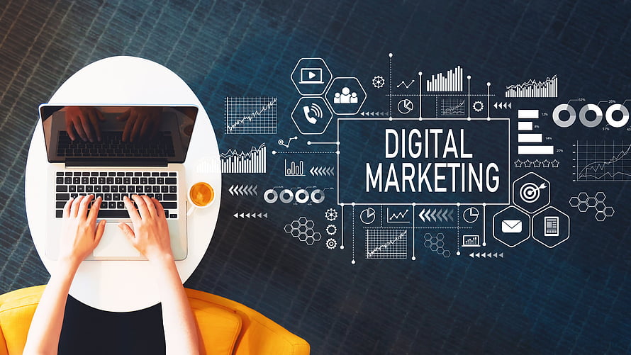 Overhead view of hands typing on a laptop with digital marketing infographic and data charts on a dark background HD wallpaper