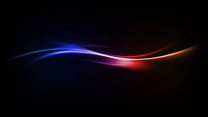 Luminous Wavy Light Streaks in Blue and Red on a Dark Abstract Background HD wallpaper