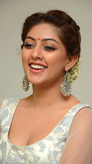 Anu Emmanuel in Traditional Indian Bridal Attire with Floral Hairpiece and Silver Jewelry HD phone wallpaper