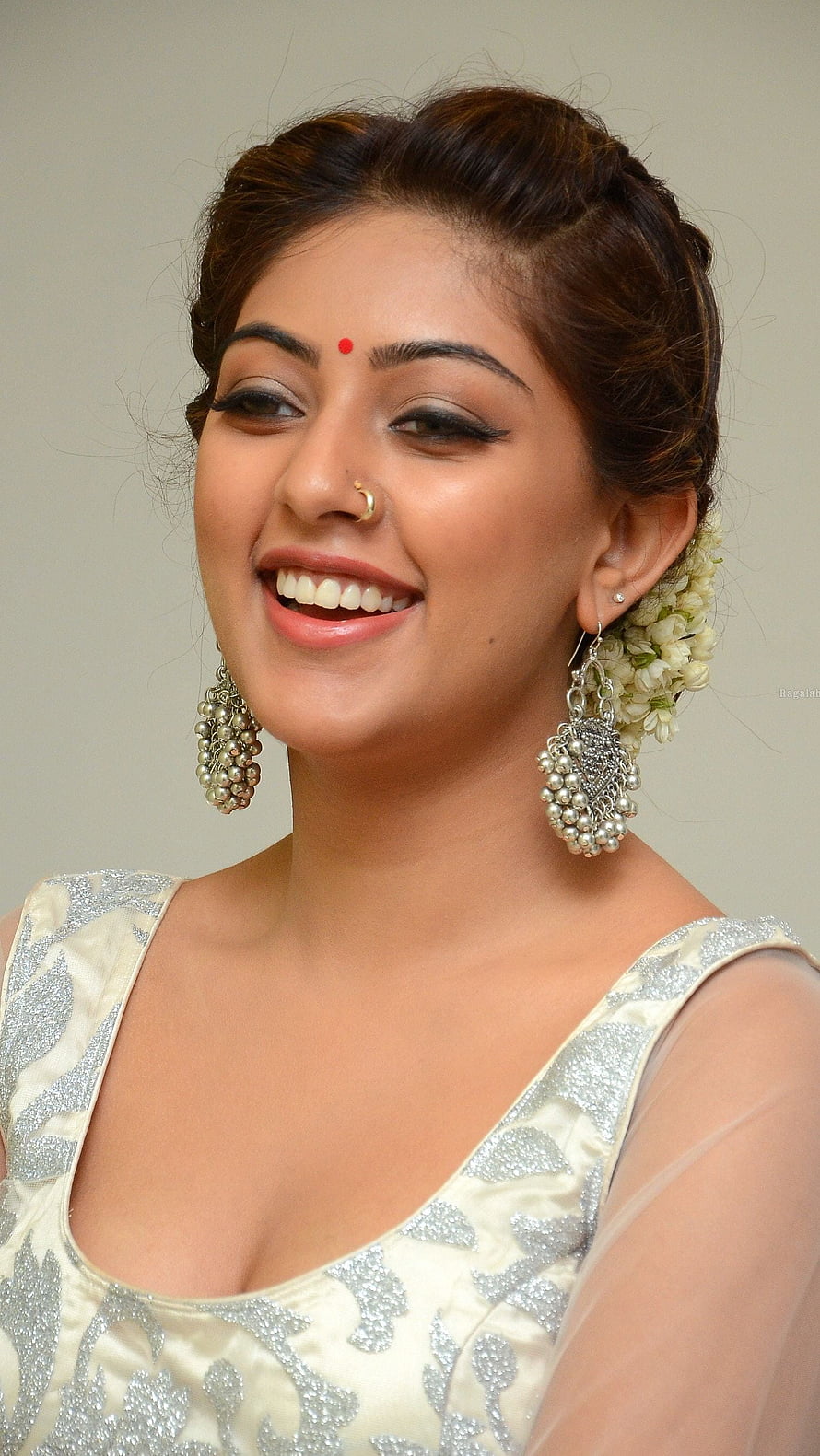 Anu Emmanuel in Traditional Indian Bridal Attire with Floral Hairpiece and Silver Jewelry HD phone wallpaper