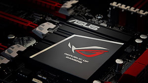 Asus Republic of Gamers Motherboard Close-Up with Red and Black Gaming Hardware HD wallpaper