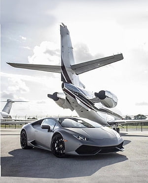 Matte Grey Lamborghini Huracan Parked in Front of Private Jet at Teterboro Airport HD phone wallpaper