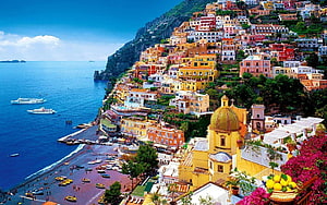 Positano on the Amalfi Coast with colorful cliffside buildings and Mediterranean sea HD wallpaper