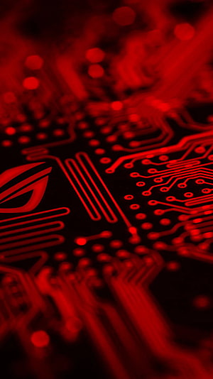 ASUS ROG Red Circuit Board Macro Photography with Glowing Traces and Bokeh HD phone wallpaper