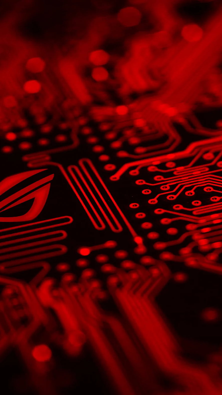 ASUS ROG Red Circuit Board Macro Photography with Glowing Traces and Bokeh HD phone wallpaper