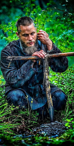 Ragnar Lothbrock Digging in the Rain from the Vikings Series HD phone wallpaper