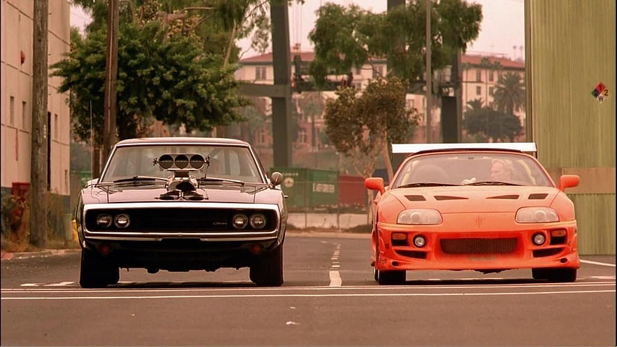 Toyota Supra and Dodge Charger Street Racing Scene from Fast and Furious HD wallpaper