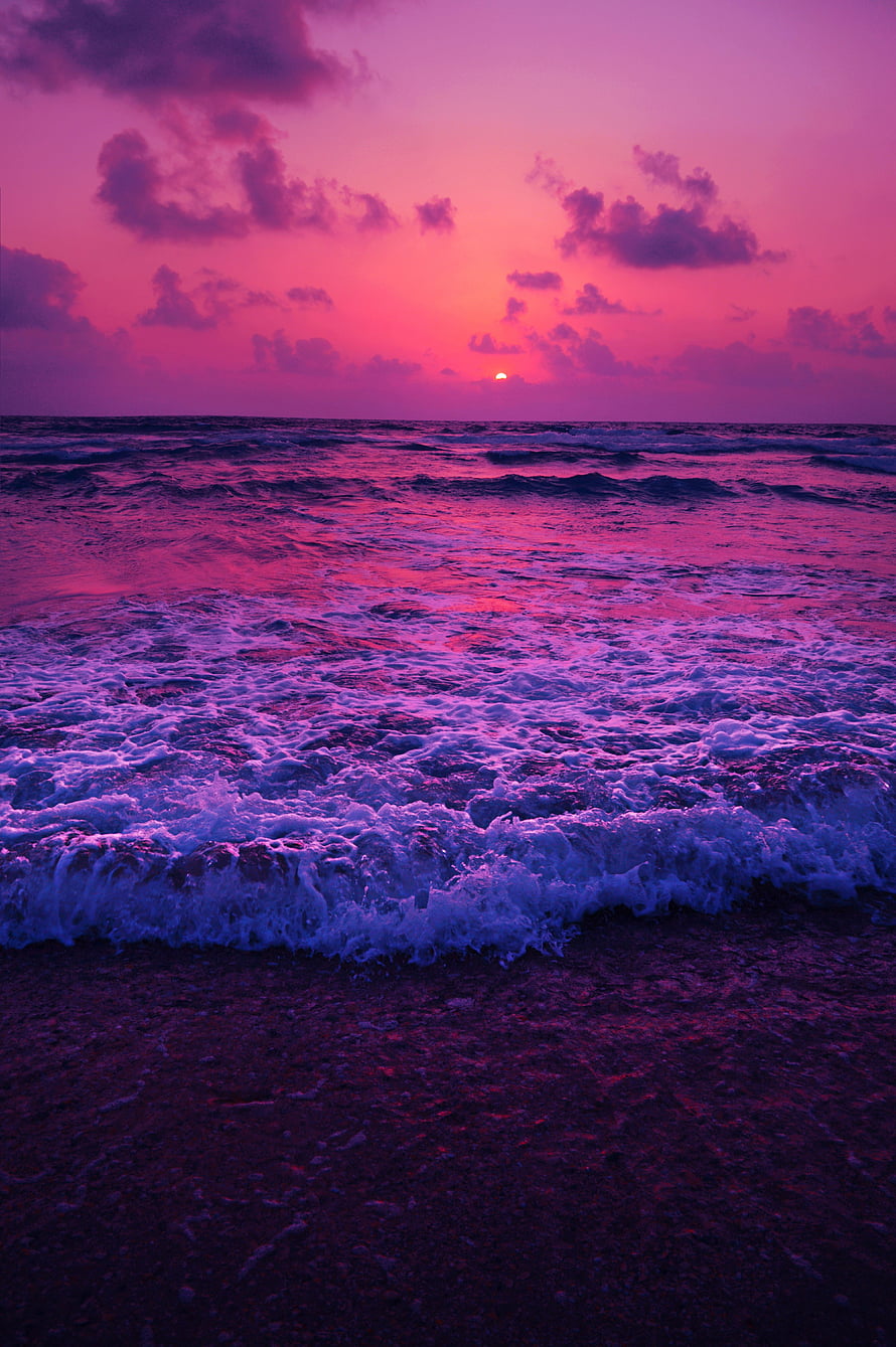 Vibrant Purple Ocean Sunset with Foaming Waves and Dramatic Clouds HD phone wallpaper
