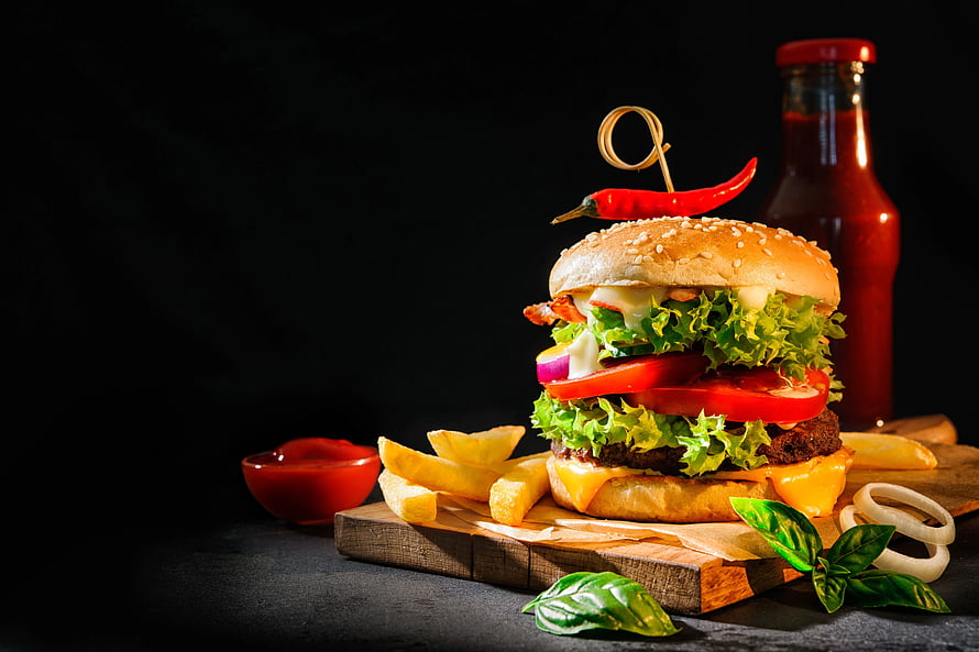 Gourmet Cheeseburger with Fresh Lettuce, Tomato, and French Fries on a Wooden Board HD wallpaper