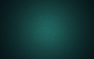 Dark Green Textured Gradient Background with Subtle Grain and Vignette HD wallpaper