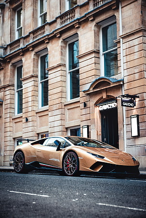 Gold Lamborghini Huracan Performante Parked on a City Street HD phone wallpaper