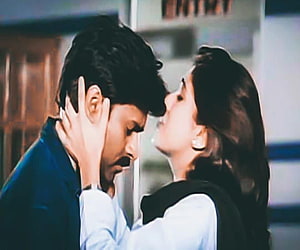 Pawan Kalyan and Actress in Intimate Romantic Scene from Tholi Prema HD wallpaper