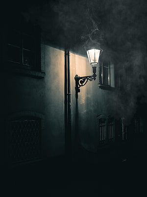 Gothic Street Scene With Glowing Lantern And Rising Smoke Against Dark Wall HD phone wallpaper