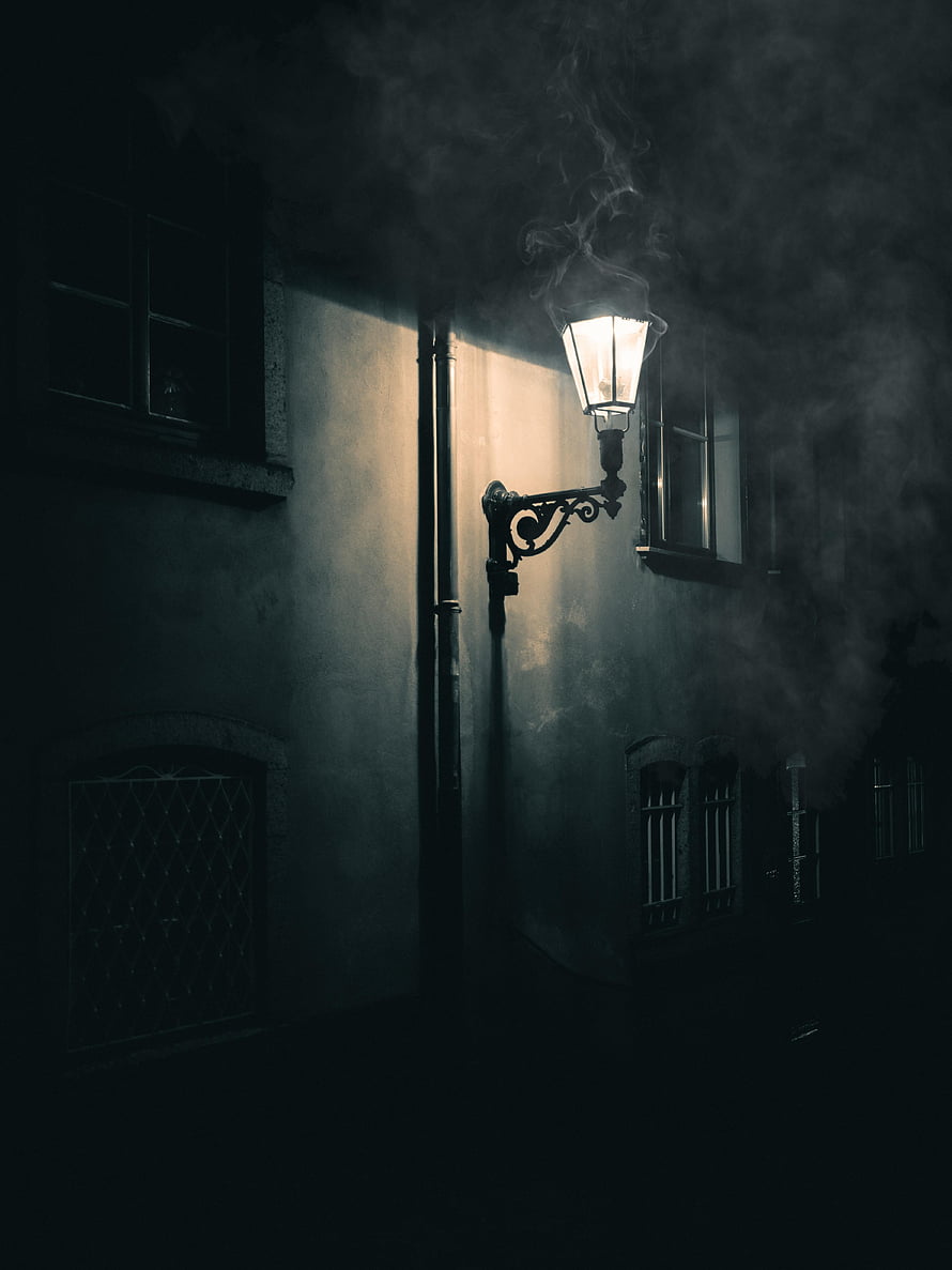 Gothic Street Scene With Glowing Lantern And Rising Smoke Against Dark Wall HD phone wallpaper
