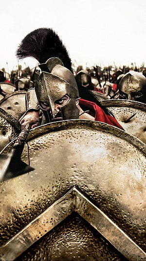 Spartan Warrior in Bronze Armor and Helmet with Red Cape in Phalanx Formation HD phone wallpaper